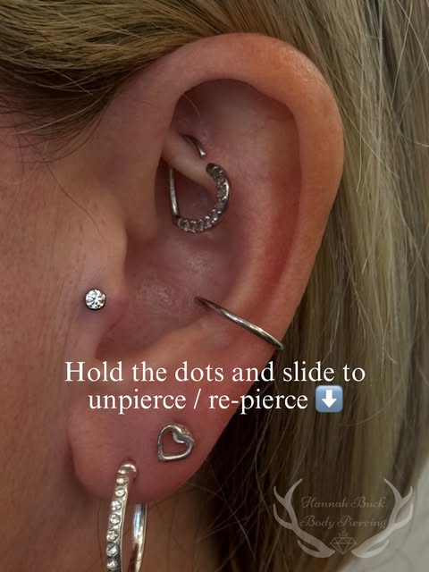 Curated ear piercing with silver jewellery from Hannah Buck Body Piercing